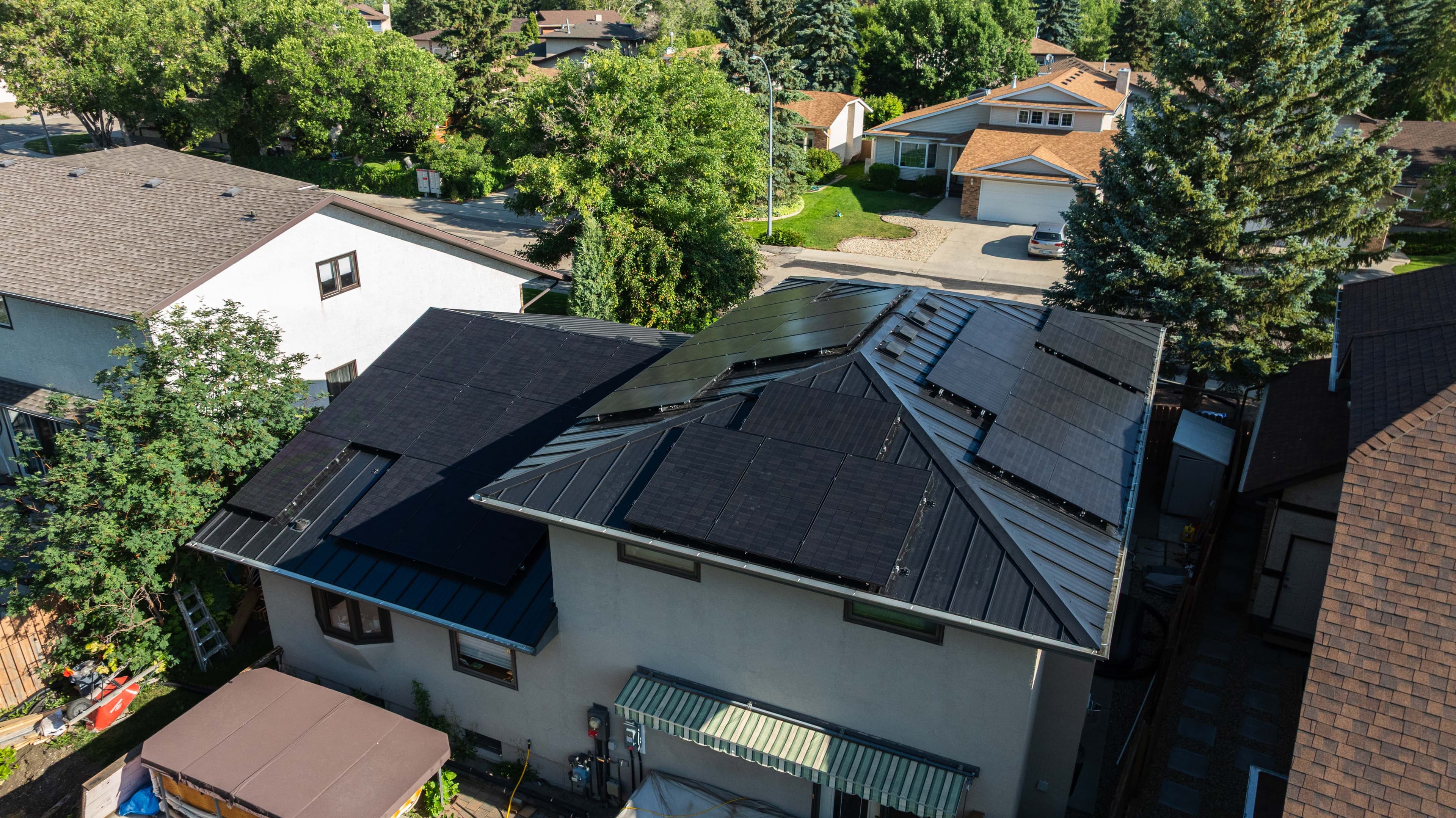 All-Black Metal-Roof Solar in Regina — 17.5 kW, 123% Offset — Connor Gorman in Regina, SK